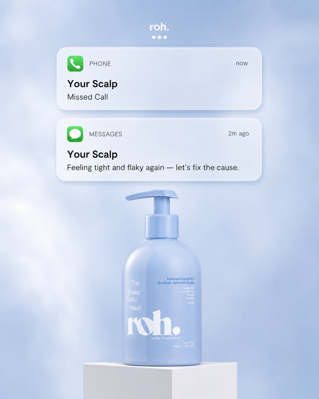 Static ad with phone notifications above a ROH scalp wash bottle on a plinth