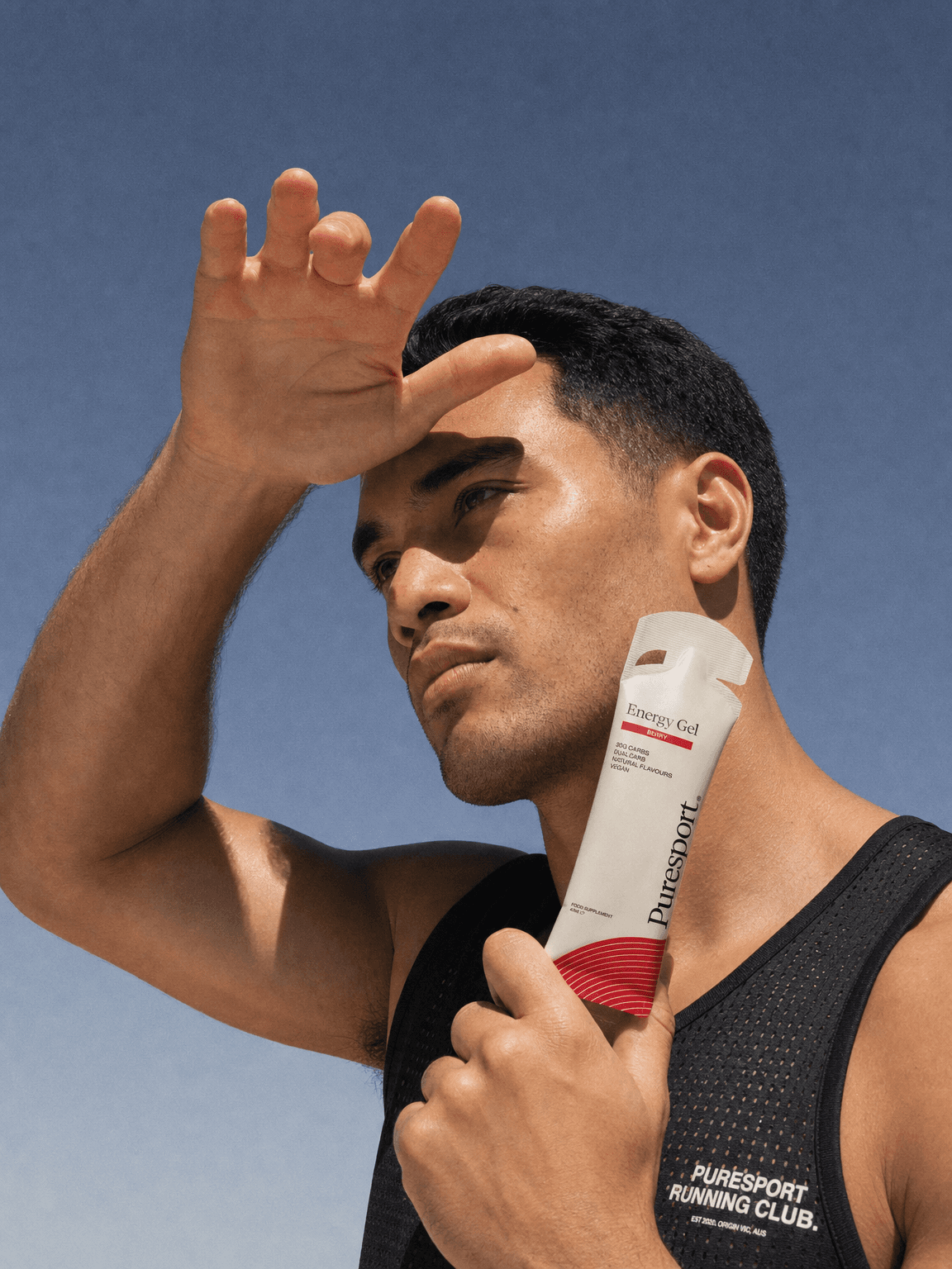 Athlete holding a product in hard sun