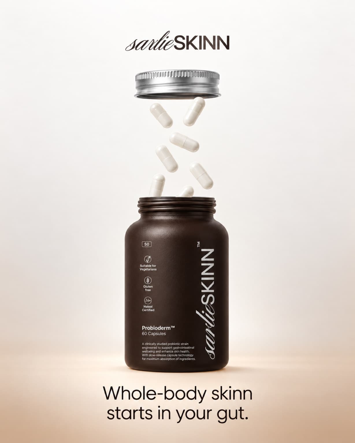Static ad: capsules pouring into an open Probioderm bottle on a pale ground